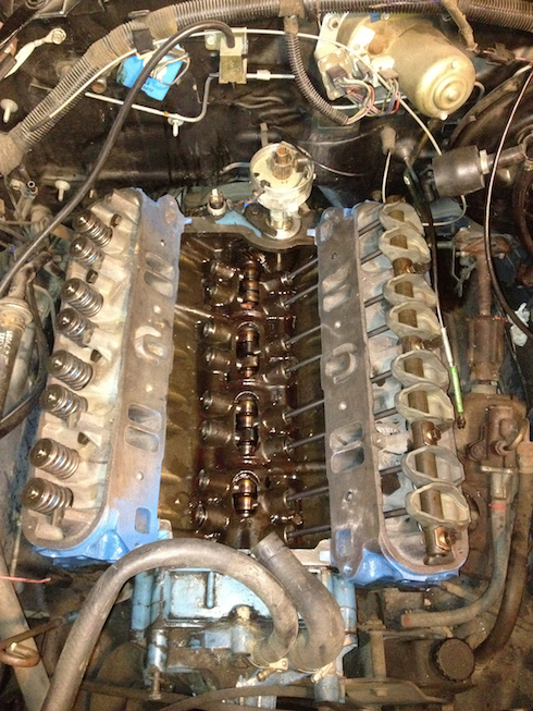 Cylinder heads painted and installed. Driver's side valve train installed.